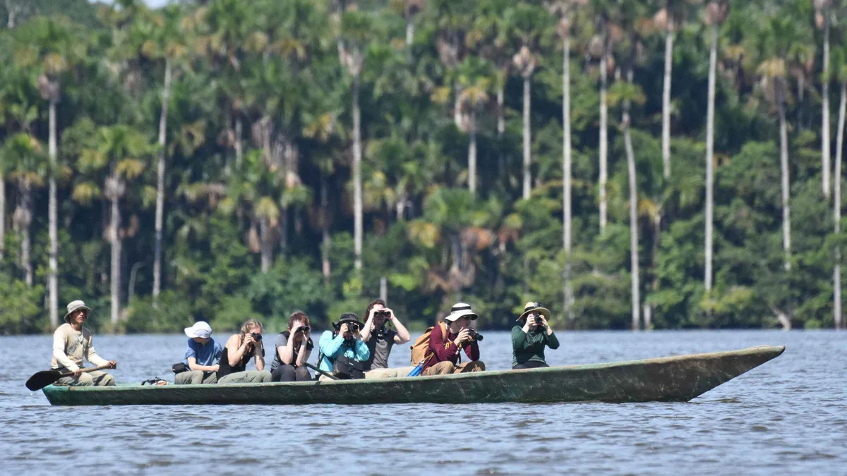 Wooden lodge terrace above the Tambopata River on a 3-day Puerto Maldonado Amazon tour with lodging, Peru